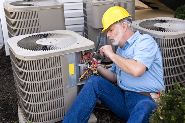 depositphotos_55686505-stock-photo-air-conditioning-repairman-at-work